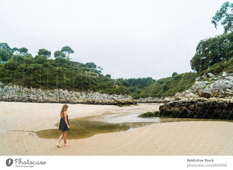 Woman walking on the beach Dream Playful Stand Coast Tide Ocean Tropical Pensive Style Beach Vacation & Travel Summer To enjoy Fashion Paradise Posture