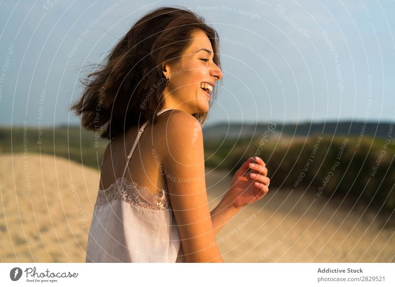 Girl smiling on the beach Beach Happiness Summer Movement Nature Vacation & Travel Cheerful enjoyment Playful Recklessness Action in motion Resort Ocean Healthy