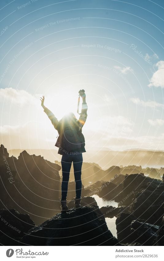 Woman with camera on cliff Tourist Cliff Rock Landscape Mountain Vacation & Travel Nature Tourism Stone Vantage point Photographer Camera Adventure Trip Freedom