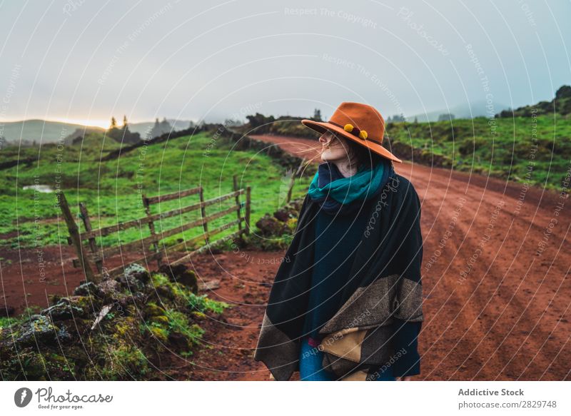 Woman on rural green road Nature Rural Landscape Street Fog Cold Lanes & trails pathway Countries Dream Calm Stand Tourism tranquil Pensive Vacation & Travel