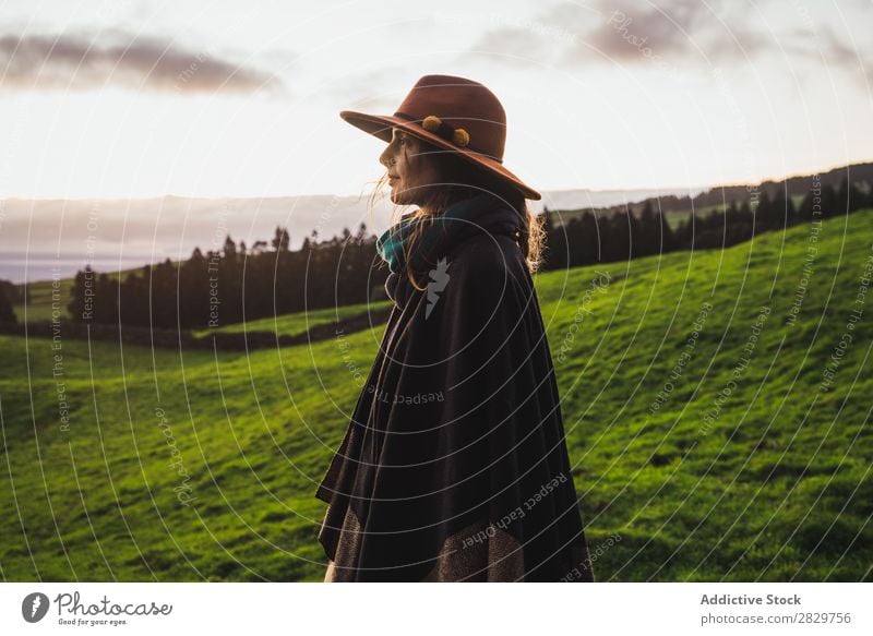 Woman in green cold fields Grassland Freedom Field Peaceful Nature Rural Wilderness scenery Stand Green Landscape Fog Dream Pasture Tourism tranquil Valley Cold