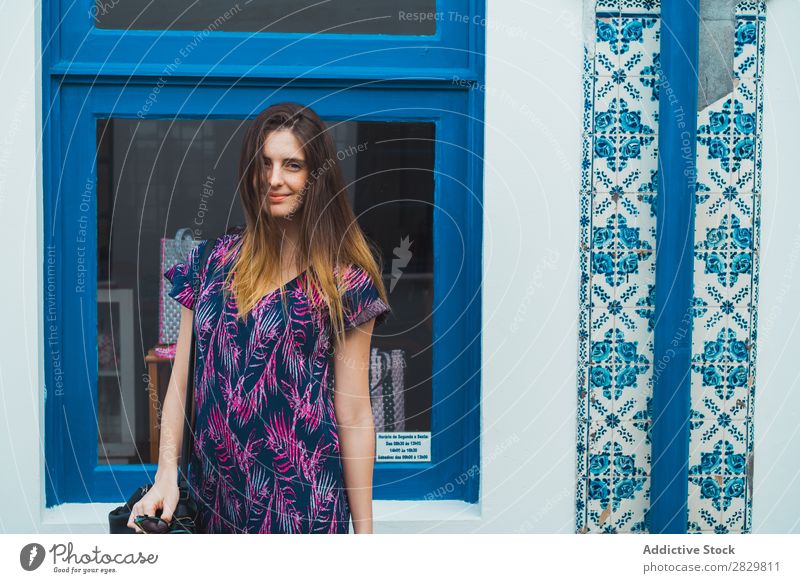 Smiling woman posing on street Woman pretty Style Street Posture Window Exterior shot Fashion Beautiful Youth (Young adults) Portrait photograph Attractive City