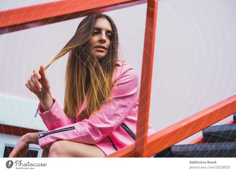 Young woman posing on stairs on street Woman pretty Style Posture holding hair Steps Stairs Happy Street Exterior shot Fashion Beautiful Youth (Young adults)