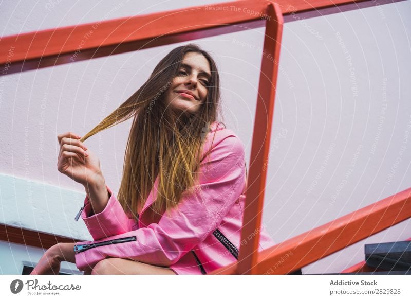 Young woman posing on stairs on street Woman pretty Style Posture holding hair Steps Stairs Happy Street Exterior shot Fashion Beautiful Youth (Young adults)