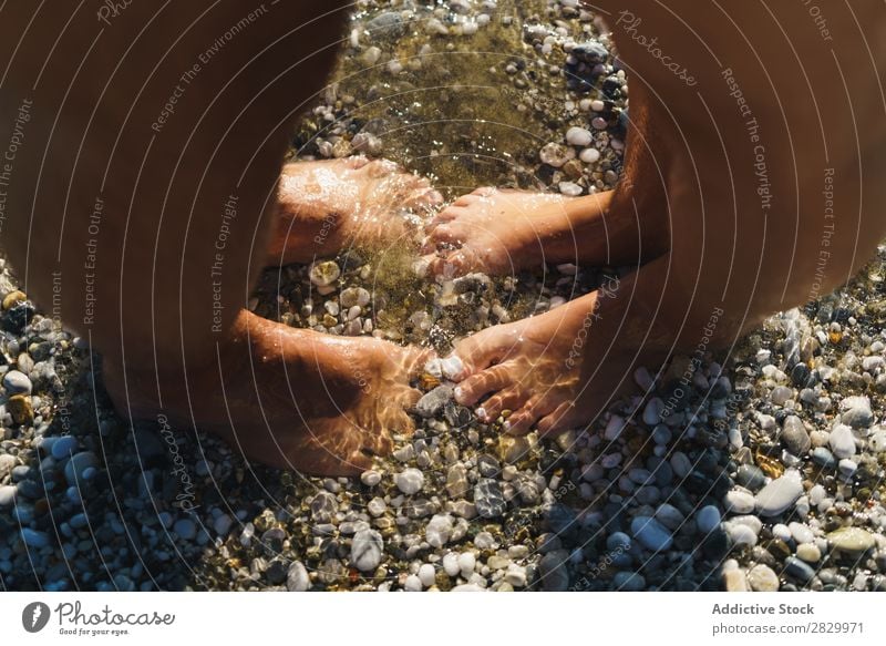 Crop couple standing on pebble beach Couple Beach Vacation & Travel Feet Together Pebble romantic Honeymoon body part Ocean 2 Coast Water loving