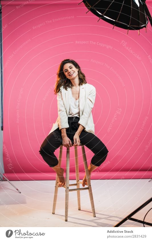 Woman on stool in studio pretty Portrait photograph Youth (Young adults) Sit Stool Beautiful Adults Posture Smiling Beauty Photography Attractive Model