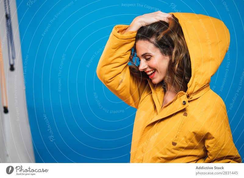 Cheerful woman in yellow jacket Woman pretty Portrait photograph Youth (Young adults) Jacket Smiling Beautiful Adults Posture Beauty Photography Attractive