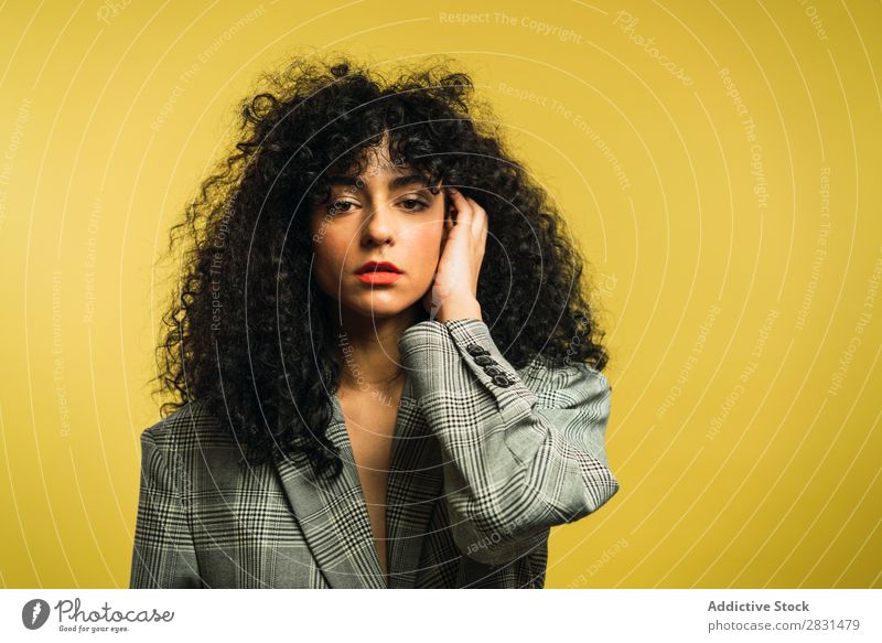 Curly woman in studio Woman pretty Portrait photograph Youth (Young adults) Hair Light Equipment Studio shot Brunette Looking into the camera Beautiful Adults