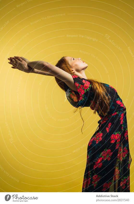 Pretty woman bending in studio Woman pretty Portrait photograph Youth (Young adults) Beautiful Back Hands up! Dance Dress Adults Posture Smiling