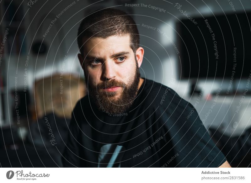 Bearded man at home Man handsome Home bearded Considerate Pensive Think Looking away Youth (Young adults) Portrait photograph Lifestyle Human being