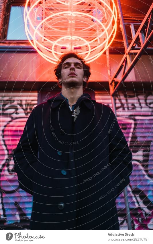 Man posing under neon circle handsome City eyes closed Neon Stand Street Youth (Young adults) Town Lifestyle Easygoing Fashion Circle Style Adults Modern