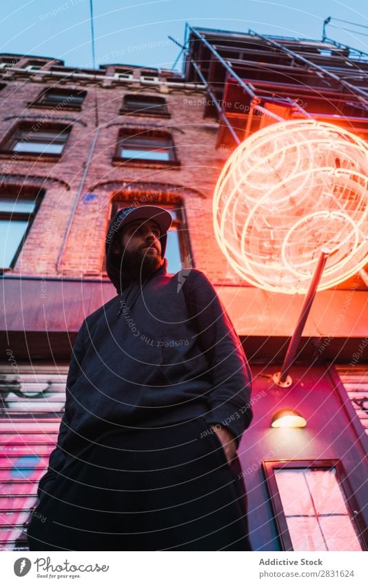 Man posing under neon circle handsome City Neon Stand Street Youth (Young adults) Town Lifestyle Easygoing Fashion Circle Style Adults Modern Human being