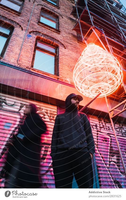 Man posing under neon circle handsome City Neon Stand Street Youth (Young adults) Town Lifestyle Easygoing Fashion Circle Style Adults Modern Human being