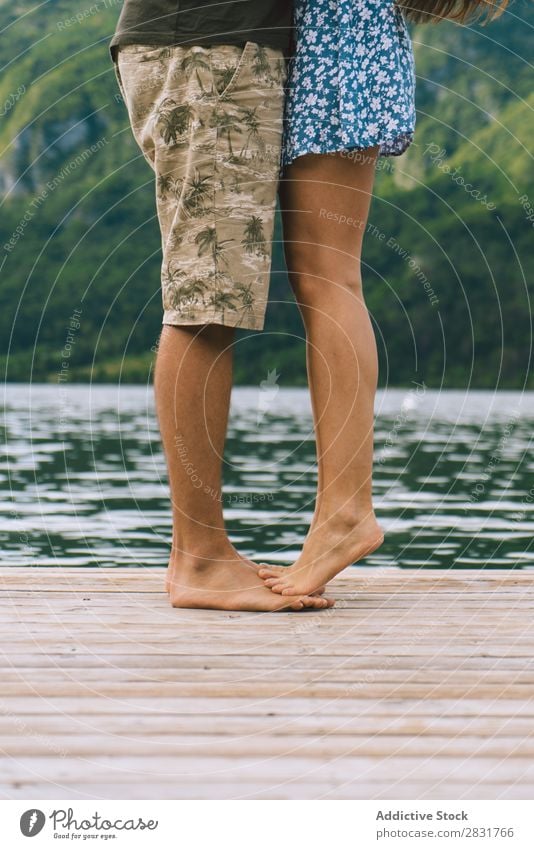 Crop couple posing on pier Couple Jetty Lake Mountain Love Together Nature Summer Water Youth (Young adults) Woman Vacation & Travel Lifestyle Human being