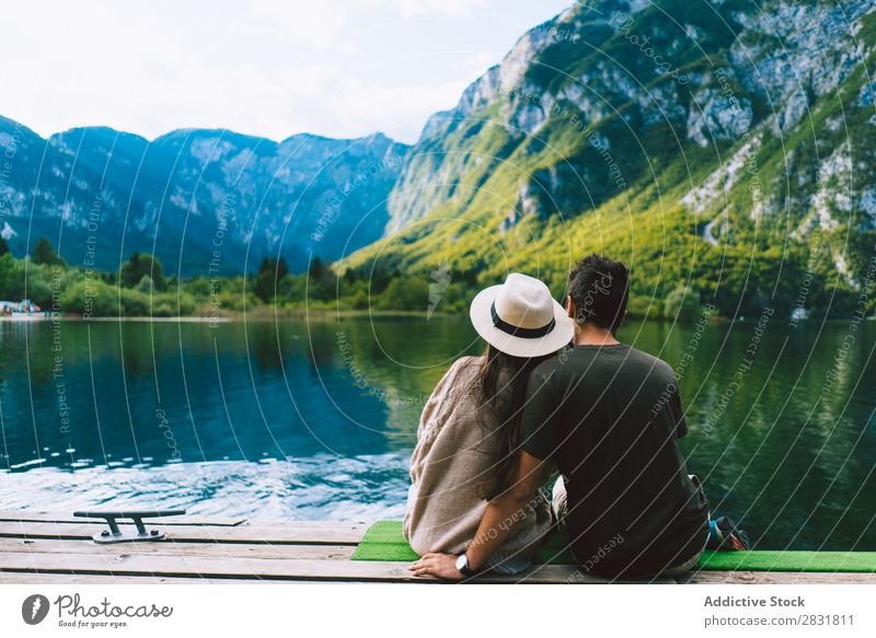 Couple sitting at lake together Lake Human being Nature Vacation & Travel Sit Jetty Love Summer Happy 2 Man Woman romantic Lifestyle Water Romance Beautiful