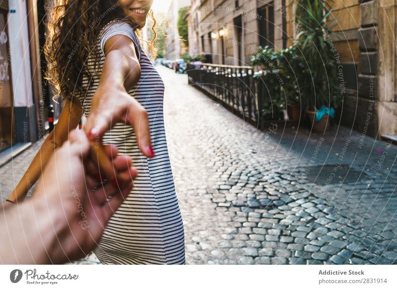 Crop cheerful traveler posing at street Woman Street Happiness romantic Summer Town spinning round waving hair Beautiful Posture in motion To enjoy Model