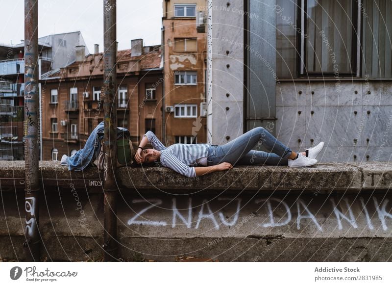 Girl posing on bridge of city Human being Grunge Bridge Posture Fence Town Youth (Young adults) Street Summer Considerate Lifestyle Beauty Photography