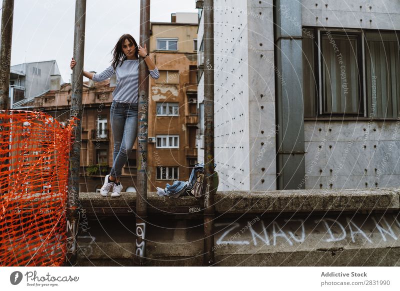 Tourist woman posing at posts Woman City Backpack Stand Posture Beautiful Vacation & Travel Street Youth (Young adults) Tourism Town Human being Lifestyle Trip