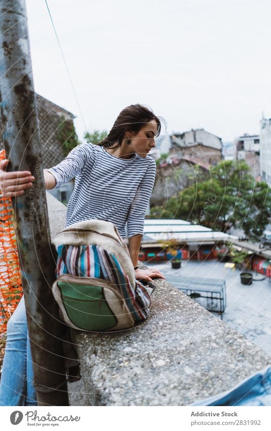 Young girl posing on cityscape Human being Traveling City Recklessness Posture Height Style Street Model Architecture Beautiful Town Youth (Young adults) Summer