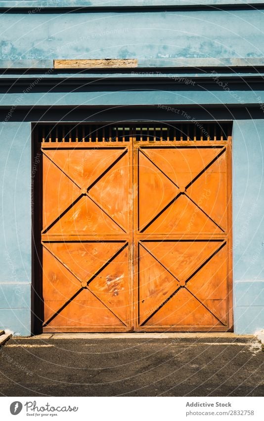 Orange gates in blue wall Exterior Gate Metal Building Consistency Wall (building) Multicoloured Entrance Colour House (Residential Structure) Bright Day