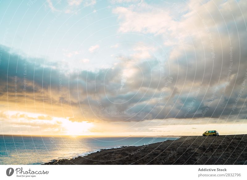 View of shoreline of ocean Coast Panorama (Format) Ocean Pebble Scene Wild Peaceful Landscape seascape Beach Remote Clouds Sky Tourism Natural scenery seaside