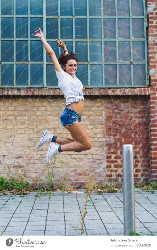 Woman jumping at street Street Posture Balance Acrobatic Feminine Joie de vivre (Vitality) gymnastic Youth (Young adults) Expression pose Expressive Performance