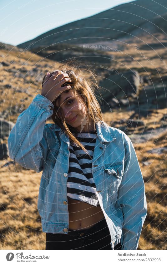 Woman standing on a rocky slope Hill Posture Attractive Beautiful pretty Gorgeous Lovely Human being Youth (Young adults) Freedom Summer Nature Vantage point