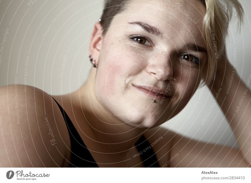 Portrait of smiling young woman with freckles and dimples Style Joy pretty Skin Life Young woman Youth (Young adults) Face pit 18 - 30 years Adults Piercing