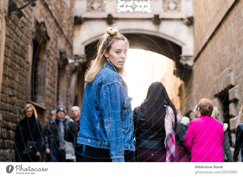 Person looking back to camera in street Woman Youth (Young adults) Crowded Street Looking into the camera Rear view Beautiful Beauty Photography