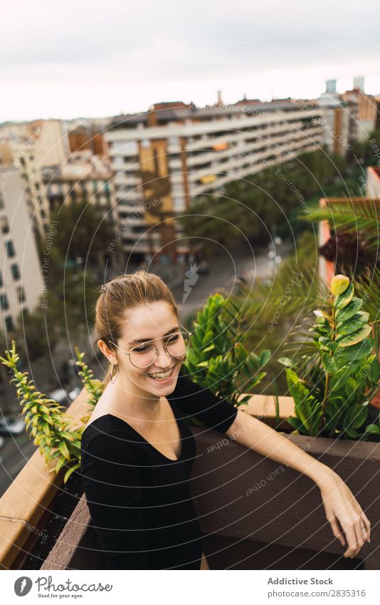 Young content model on terrace Woman Happiness Posture Terrace Cheerful Self-confident To enjoy Relaxation Leisure and hobbies Freedom Summer Fresh Action Calm