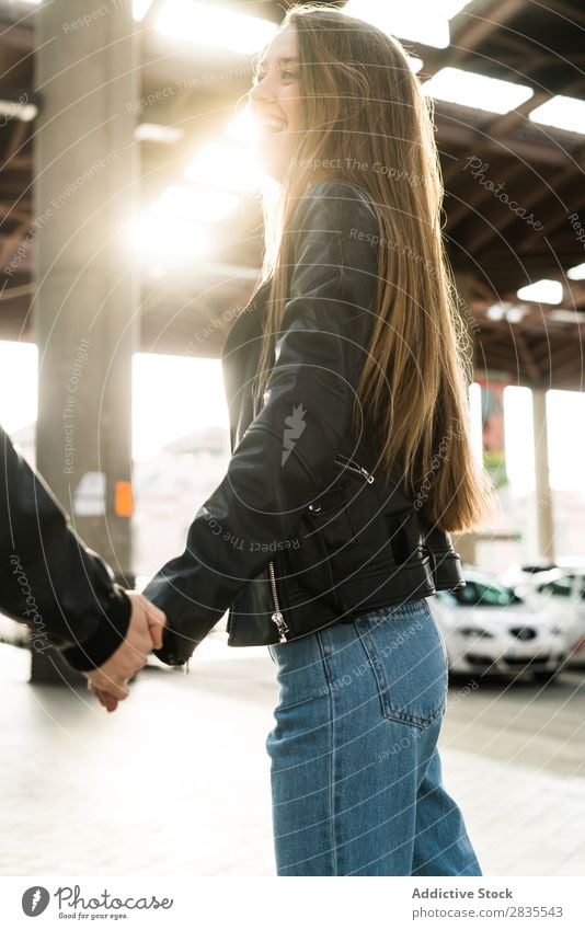 Pretty girl walking with friend Woman pretty holding hands Friendship Together Walking Cheerful Smiling Beautiful Portrait photograph Posture Beauty Photography