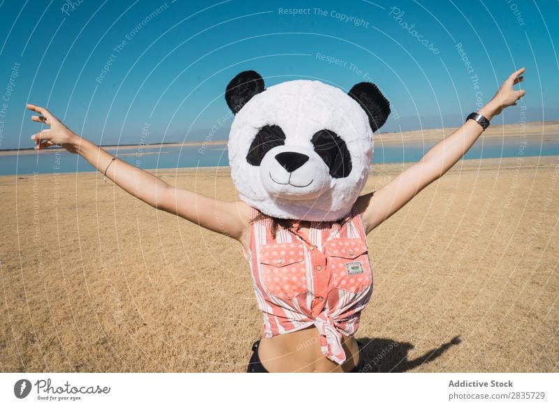 Woman with panda hat posing on nature Hat Creativity Panda Costume Traveling Nature Wear having fun Landscape Relaxation Wanderlust Artificial Style pose