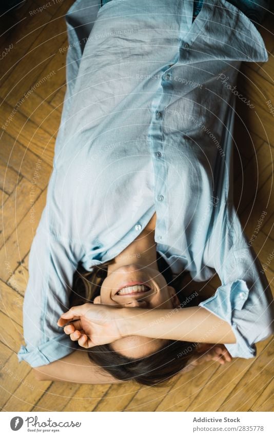 Smiling woman lying on floor Woman Story Beautiful Youth (Young adults) Happy Attractive Easygoing pretty Human being Portrait photograph Cheerful Home Cute