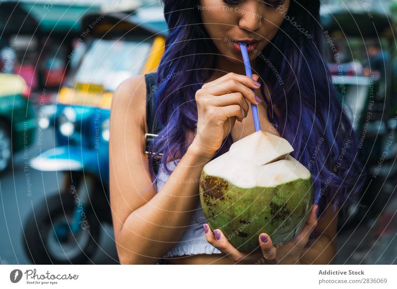 Asian woman drinking from coconut Woman pretty Street Youth (Young adults) Beautiful Portrait photograph Coconut Drinking Straw Hair Purple asian eastern