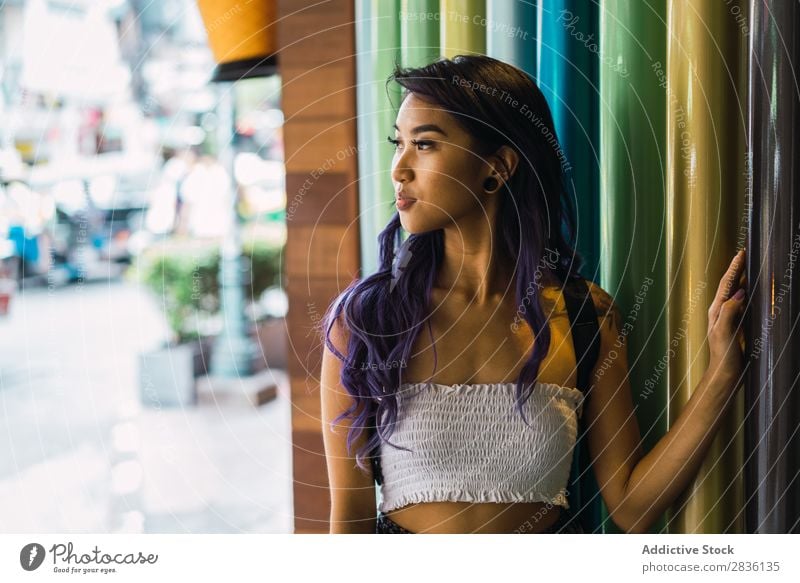 Young woman leaning on colorful columns Woman pretty Street Youth (Young adults) Beautiful Column Lean Multicoloured Portrait photograph Hair Purple asian