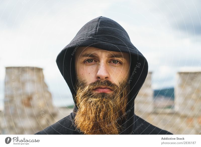 Bearded man in hood Man bearded Lifestyle Wanderlust human face traveler Car Hood Nature Portrait photograph Model Adventure Landscape handsome Easygoing