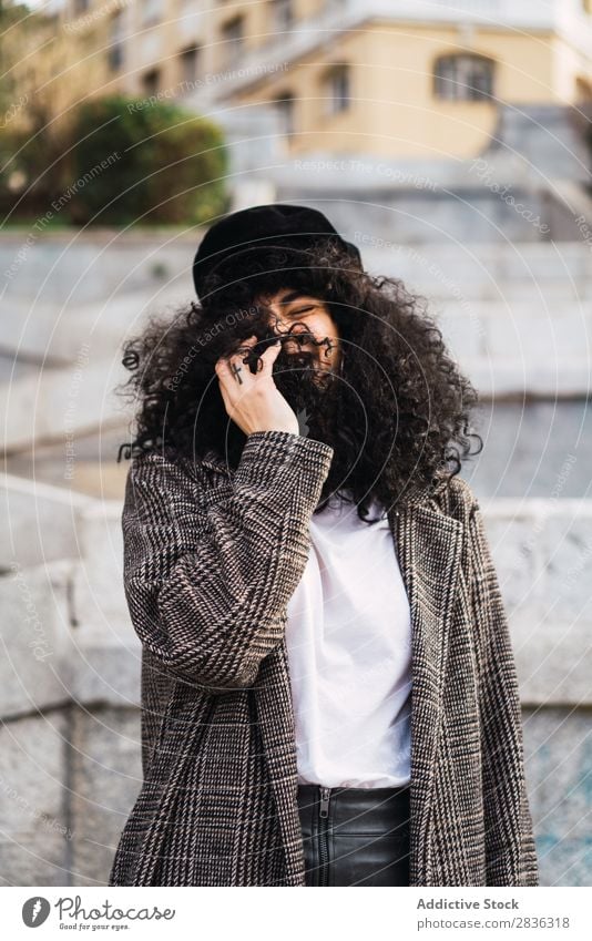 Pretty stylish woman in park Woman Attractive City fashionable Curly Brunette Park Green Coat Hat Fashion Youth (Young adults) Beautiful pretty Street Model