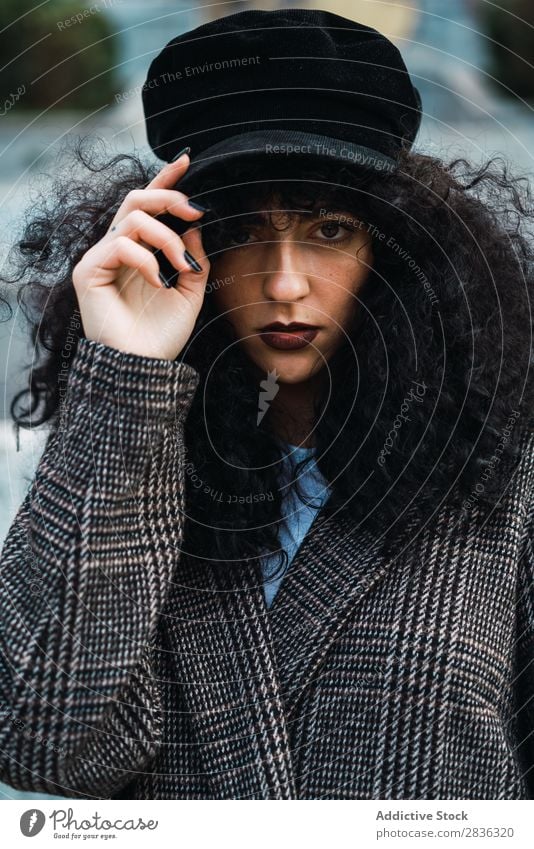 Pretty stylish woman in park Woman Attractive City fashionable Curly Brunette Park Green Coat Hat Fashion Youth (Young adults) Beautiful pretty Street Model