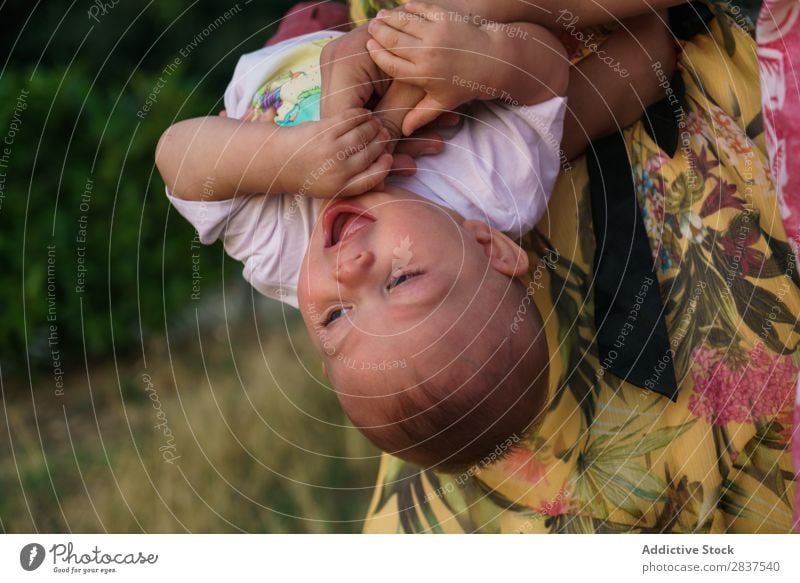 Cute child on hands of mother Child Park Lawn Green Mother Family & Relations Happy Human being Woman Happiness Summer Lifestyle Love Parents Nature