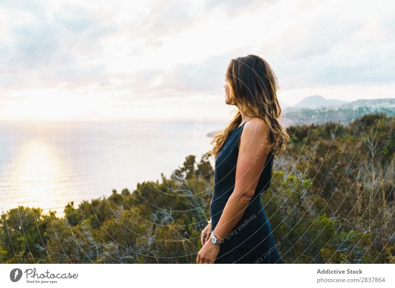 Woman posing on nature Landscape Posture Ocean Tourist Adventure Nature Panorama (Format) Freedom Relaxation Traveling romantic achievement Tropical Summer