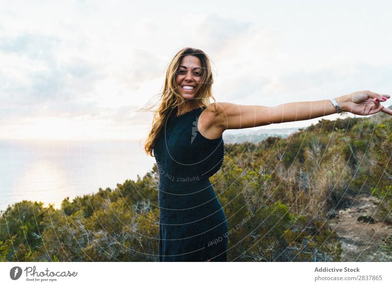 Woman posing on nature Landscape Posture Ocean Tourist Adventure Nature Panorama (Format) Freedom Relaxation Traveling romantic achievement Tropical Summer