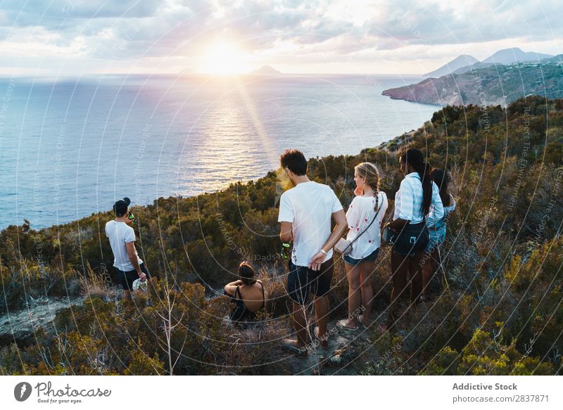 Group of people standing on cliff Human being Tourism Landscape Freedom Action Ocean Adventure Summer Exterior shot Vacation & Travel Tourist multiethnic Black