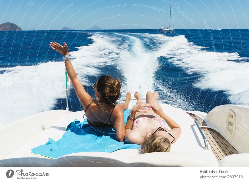 Women relaxing on boat Woman Summer having fun Sailboat Yacht Sailing Homosexual Relaxation Couple Ocean Youth (Young adults) Vacation & Travel Vessel