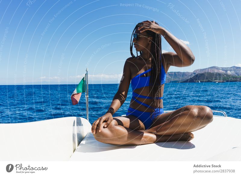 Stylish girl posing on yacht Woman Yacht Posture Summer Vacation & Travel Model Laughter Beautiful Self-confident Contentment Cruise Ocean Cheerful Feminine