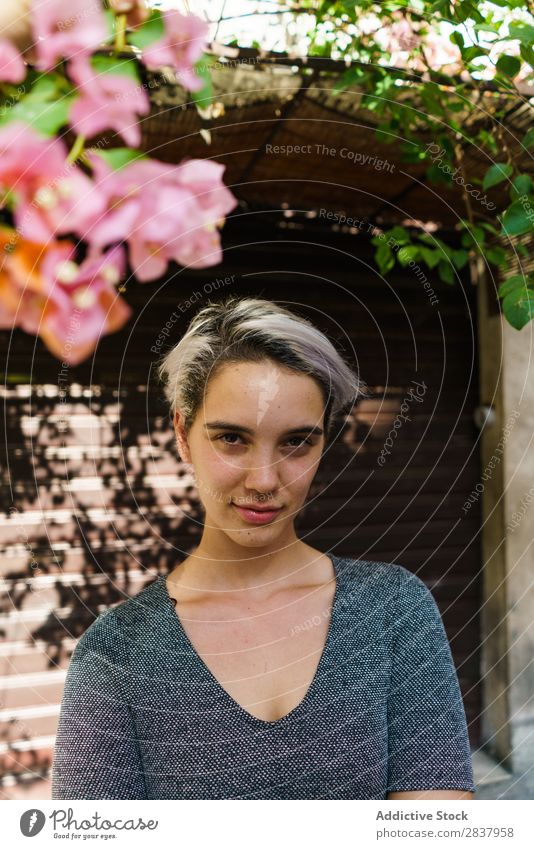 Smiling woman at blooming tree Woman Street Flower Tree Blooming Posture Cheerful Summer Spring City Attractive Girl Beautiful Hair Happy Youth (Young adults)