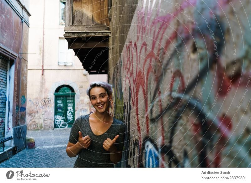 Smiling woman in alley Woman Alley Graffiti Wall (building) pretty Street Lifestyle Cheerful Calm Relaxation Blonde Walking Lovely Attractive Lady City