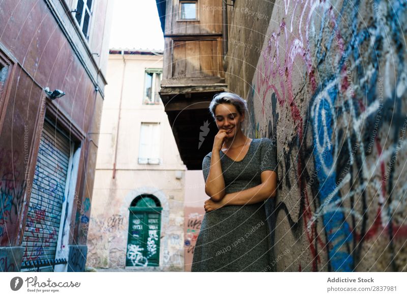 Smiling woman in alley Woman Alley Graffiti Wall (building) pretty Street Lifestyle Cheerful Calm Relaxation Blonde Walking Lovely Attractive Lady City