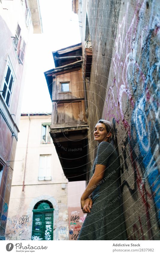 Smiling woman in alley Woman Alley Graffiti Wall (building) pretty Street Lifestyle Cheerful Calm Relaxation Blonde Walking Lovely Attractive Lady City