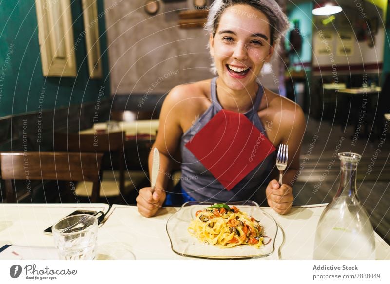 Content woman having meal Woman Plate Happiness Emotions Food Gourmet Grimace Dinner having fun Easygoing Hold Lunch pretend Preparation Café Dish