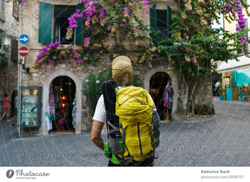 Man posing in city backpacker Tourist Town Memory romantic Street Traveling City Lifestyle Easygoing Summer Vacation & Travel Youth (Young adults) Sightseeing